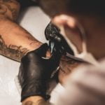 a man in a black glove