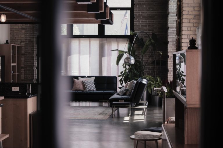 a living room with a couch and a table