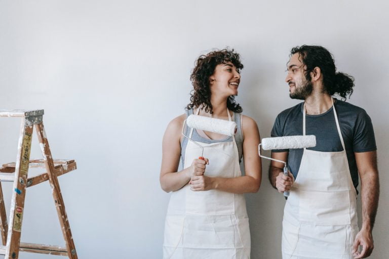 a man and woman smiling