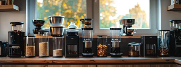 an assortment of automatic pet feeders displayed on a kitchen counter.